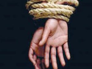 Hands tied with rope
